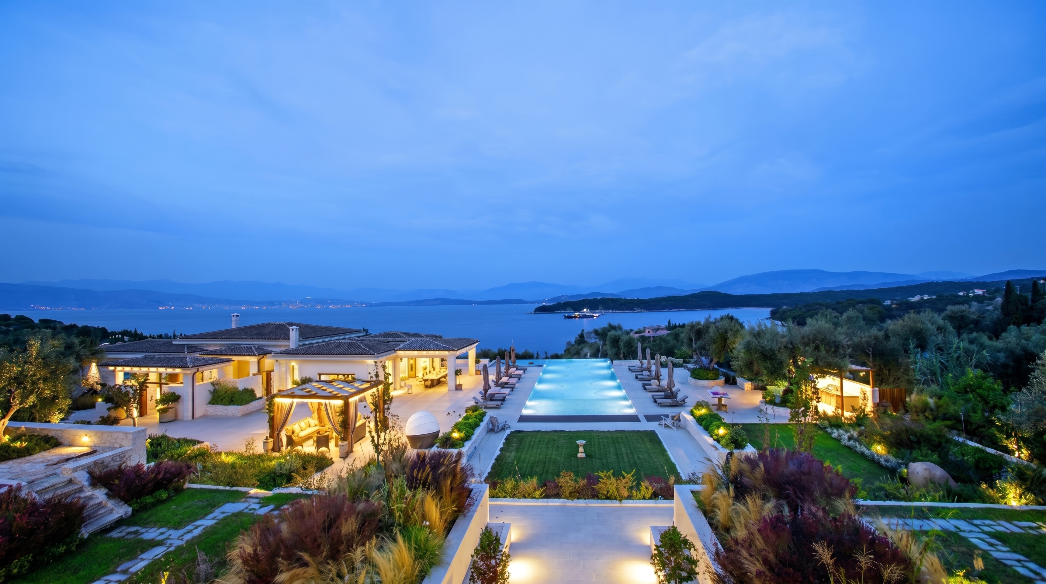 A monumental hand-built Corfu stone wall against the Ionian sea.